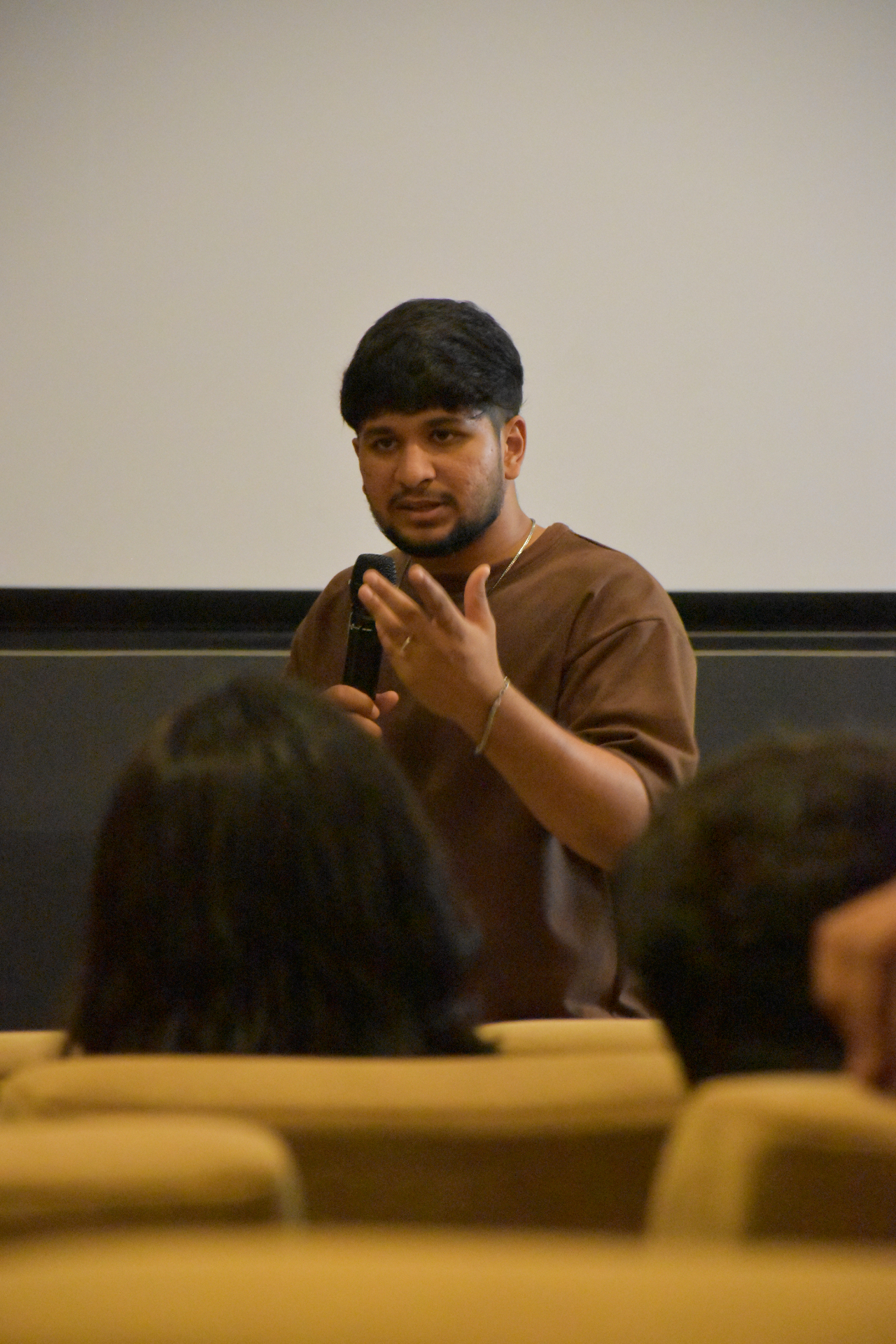 Ayman William speaking at an event